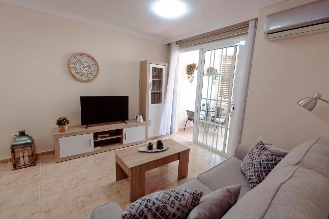 Apto ACHE, acogedor apartamento de 66 m con terraza, aire acondicionado y parking privado gratuito Los Abrigos España