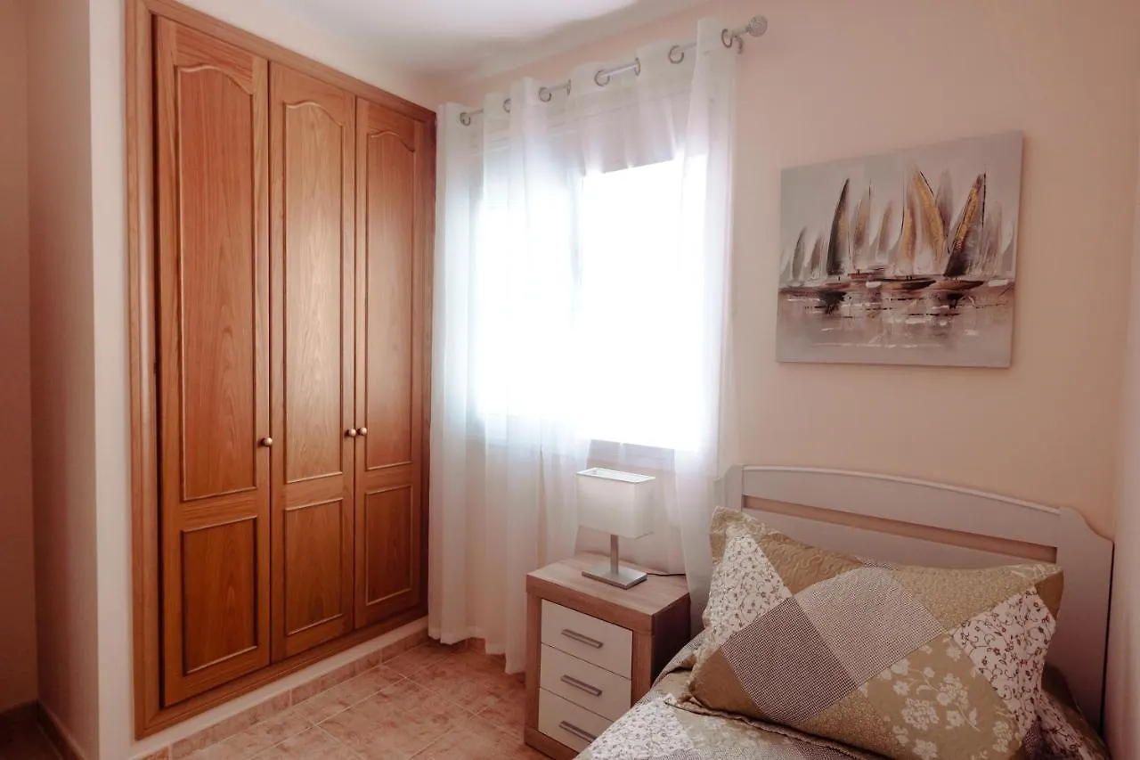 Apto ACHE, acogedor apartamento de 66 m con terraza, aire acondicionado y parking privado gratuito Los Abrigos